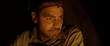 Movie still from “O Brother, Where Art Thou?” (2000), directed by Joel Coen – A person wearing a hat; Close Up shot, Low angle