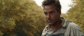 Movie still from “O Brother, Where Art Thou?” (2000), directed by Joel Coen – A person with a beard; Close Up shot, Low angle