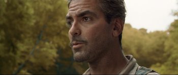 Movie still from “O Brother, Where Art Thou?” (2000), directed by Joel Coen – A person looking at the camera; Close Up shot, Low angle