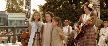 Movie still from “O Brother, Where Art Thou?” (2000), directed by Joel Coen – A group of young girls standing next to each other; Medium shot, Low angle