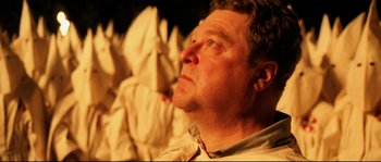 Movie still from “O Brother, Where Art Thou?” (2000), directed by Joel Coen – A person looking up; Close Up shot, Low angle