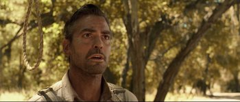 Movie still from “O Brother, Where Art Thou?” (2000), directed by Joel Coen – A person wearing a shirt; Close Up shot, Low angle