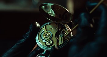 Movie still from “Pan's Labyrinth” (2006), directed by Guillermo del Toro – The inside of an open pocket watch; Extreme Close Up shot, Overhead angle