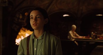 Movie still from “Pan's Labyrinth” (2006), directed by Guillermo del Toro – A young girl standing in front of a fireplace; Close Up shot, Low angle