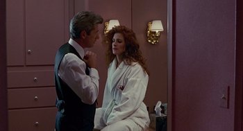 Movie still from “Pretty Woman” (1990), directed by Garry Marshall – A man and a woman in a dressing room; Medium shot, Over the shoulder angle