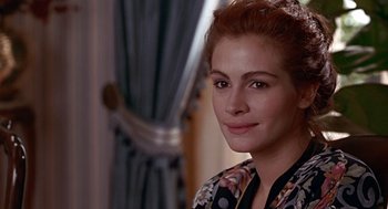 Movie still from “Pretty Woman” (1990), directed by Garry Marshall – A person wearing a dress; Close Up shot, Over the shoulder angle