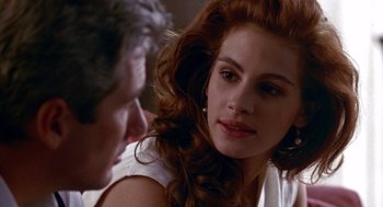 Movie still from “Pretty Woman” (1990), directed by Garry Marshall – A man and a woman looking at one another; Close Up shot, Over the shoulder angle