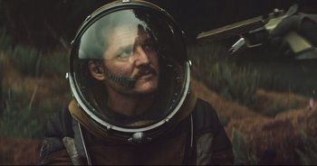 A man wearing a space suit and a helmet