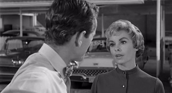 Movie still from “Psycho” (1960), directed by Alfred Hitchcock – A man and a woman talking to each other; Close Up shot, Over the shoulder angle