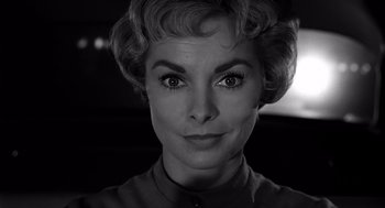 Movie still from “Psycho” (1960), directed by Alfred Hitchcock – A black and white photo of a woman's face; Close Up shot, Low angle
