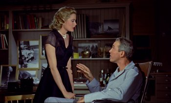 Movie still from “Rear Window” (1954), directed by Alfred Hitchcock – A man and a woman talking in a living room; Medium shot, Over the shoulder angle