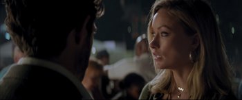 Movie still from “Richard Jewell” (2019), directed by Clint Eastwood – A beautiful blonde woman standing next to a man; Close Up shot, Over the shoulder angle