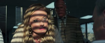 Movie still from “Richard Jewell” (2019), directed by Clint Eastwood – A man and a woman with their faces distorted by the light; Close Up shot, Over the shoulder angle