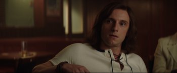 Movie still from “Rocketman” (2019), directed by Dexter Fletcher – A person sitting in a room; Close Up shot, Over the shoulder angle