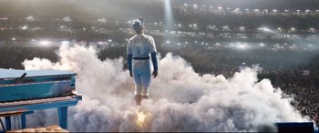 Movie still from “Rocketman” (2019), directed by Dexter Fletcher – A baseball player standing in the middle of a field; Extreme Wide shot, High angle