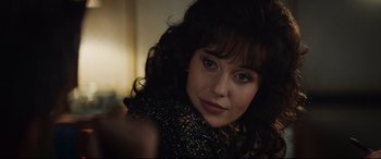 Movie still from “Rocketman” (2019), directed by Dexter Fletcher – A woman with blue eyes; Close Up shot, Over the shoulder angle