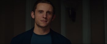 Movie still from “Rocketman” (2019), directed by Dexter Fletcher – A person wearing a blue shirt; Close Up shot, Over the shoulder angle