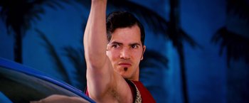 Movie still from “Romeo + Juliet” (1996), directed by Baz Luhrmann – A person with a beard; Close Up shot, Low angle