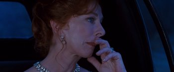 Movie still from “Romeo + Juliet” (1996), directed by Baz Luhrmann – A person wearing a ring; Close Up shot, Over the shoulder angle