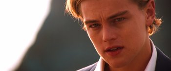Movie still from “Romeo + Juliet” (1996), directed by Baz Luhrmann – A young man's face; Close Up shot, Low angle