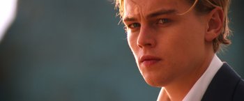 Movie still from “Romeo + Juliet” (1996), directed by Baz Luhrmann – A young man's face; Close Up shot, Low angle