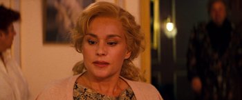 Movie still from “Romeo + Juliet” (1996), directed by Baz Luhrmann – A person with blonde hair; Close Up shot, Over the shoulder angle