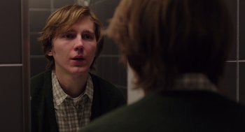 Movie still from “Ruby Sparks” (2012), directed by Valerie Faris – A man looking at himself in the mirror in front of a mirror; Close Up shot, Over the shoulder angle
