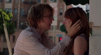 Movie still from “Ruby Sparks” (2012), directed by Valerie Faris – A man and a woman are standing together outside; Close Up shot, Over the shoulder angle