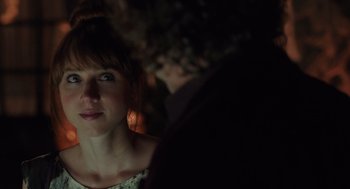 Movie still from “Ruby Sparks” (2012), directed by Valerie Faris – A person looking at the camera; Close Up shot, Over the shoulder angle