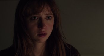Movie still from “Ruby Sparks” (2012), directed by Valerie Faris – A person with long red hair; Close Up shot, Over the shoulder angle