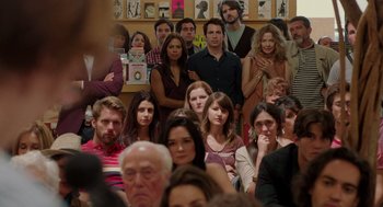 Movie still from “Ruby Sparks” (2012), directed by Valerie Faris – A group of people sitting in a room; Medium shot, Over the shoulder angle
