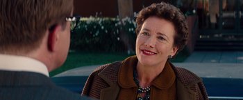 Movie still from “Saving Mr. Banks” (2013), directed by John Lee Hancock – An older woman is smiling for the camera; Close Up shot, Over the shoulder angle