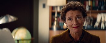Movie still from “Saving Mr. Banks” (2013), directed by John Lee Hancock – A person wearing a jacket; Close Up shot, Over the shoulder angle