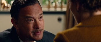 Movie still from “Saving Mr. Banks” (2013), directed by John Lee Hancock – A person sitting in a room; Close Up shot, Over the shoulder angle