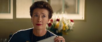 Movie still from “Saving Mr. Banks” (2013), directed by John Lee Hancock – An older woman is holding a piece of paper; Close Up shot, Over the shoulder angle