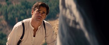 Movie still from “Saving Mr. Banks” (2013), directed by John Lee Hancock – A person wearing a white shirt; Close Up shot, Over the shoulder angle