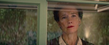 Movie still from “Saving Mr. Banks” (2013), directed by John Lee Hancock – A person looking out of a window; Close Up shot, Low angle