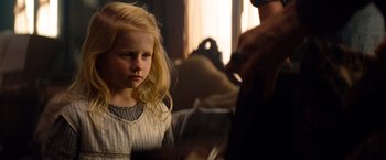 Movie still from “Saving Mr. Banks” (2013), directed by John Lee Hancock – A little girl looking at a man in a room; Close Up shot, Over the shoulder angle