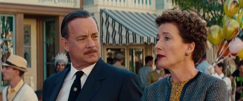 Movie still from “Saving Mr. Banks” (2013), directed by John Lee Hancock – A man and a woman standing next to each other; Close Up shot, Over the shoulder angle