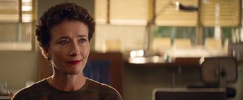 Movie still from “Saving Mr. Banks” (2013), directed by John Lee Hancock – A person wearing a plaid shirt; Close Up shot, Over the shoulder angle