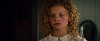 Movie still from “Saving Mr. Banks” (2013), directed by John Lee Hancock – A young girl with curly hair; Close Up shot, High angle