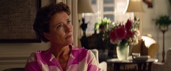 Movie still from “Saving Mr. Banks” (2013), directed by John Lee Hancock – A person sitting in a room near a window; Close Up shot, Over the shoulder angle