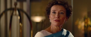 Movie still from “Saving Mr. Banks” (2013), directed by John Lee Hancock – An older woman wearing a white and blue dress; Close Up shot, Over the shoulder angle