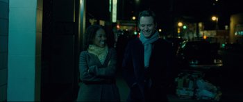 Movie still from “Shame” (2011), directed by Steve McQueen – A man and a woman walking down a street at night; Medium shot, Low angle