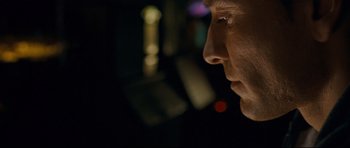 Movie still from “Shame” (2011), directed by Steve McQueen – A man's face in the dark; Extreme Close Up shot, Low angle