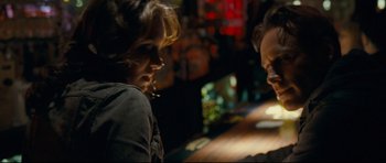 Movie still from “Shame” (2011), directed by Steve McQueen – A man and a woman talking in front of each other; Close Up shot, Over the shoulder angle