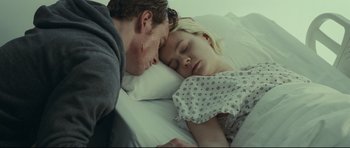 Movie still from “Shame” (2011), directed by Steve McQueen – A man and a woman sleeping in a bed together; Close Up shot, High angle