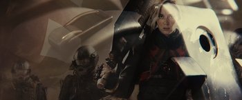 Movie still from “Edge of Tomorrow” (2014), directed by Doug Liman – A person holding a sword; Close Up shot, Over the shoulder angle