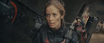 Movie still from “Edge of Tomorrow” (2014), directed by Doug Liman – A person wearing a suit and helmet; Close Up shot, Over the shoulder angle