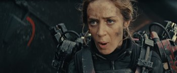 Movie still from “Edge of Tomorrow” (2014), directed by Doug Liman – A person with a gun; Close Up shot, Over the shoulder angle